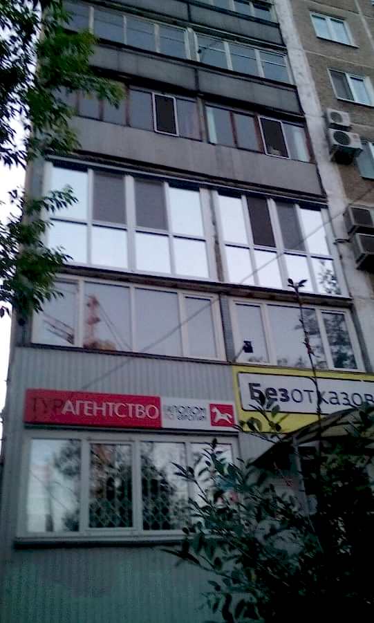 Фото тонировки окна пленкой на лоджии. Астана, ул. Пушкина